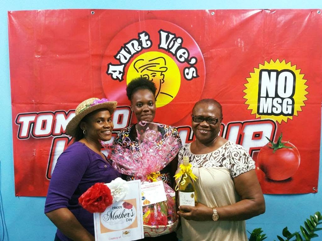 Three women celebrating a community Mother's Day moment with Jus Great
